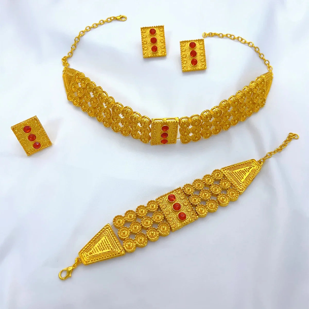 Close-up of Bilen Msgnet gold choker with red crystal stones – Eritrean cultural jewelry-Natna Shop