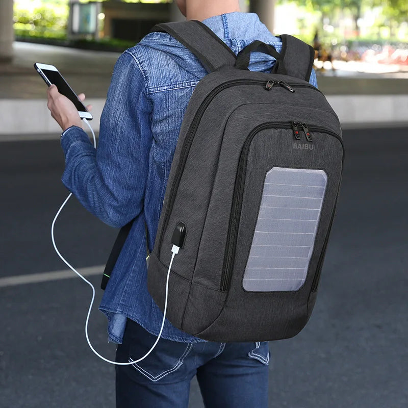 man wearing waterproof solar backpack outdoors Black
