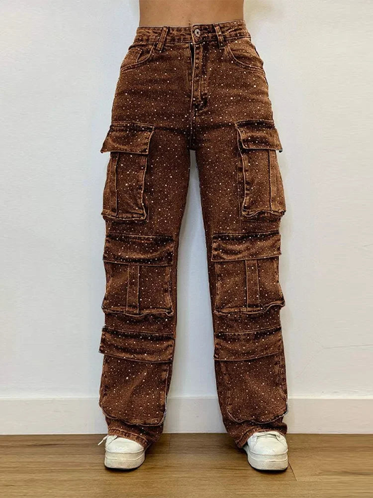 Front view of high-waisted rhinestone Brown jeans with polka dots, worn by a fashion model at Home.