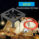 Camping stove with gas hose on a camping scene background